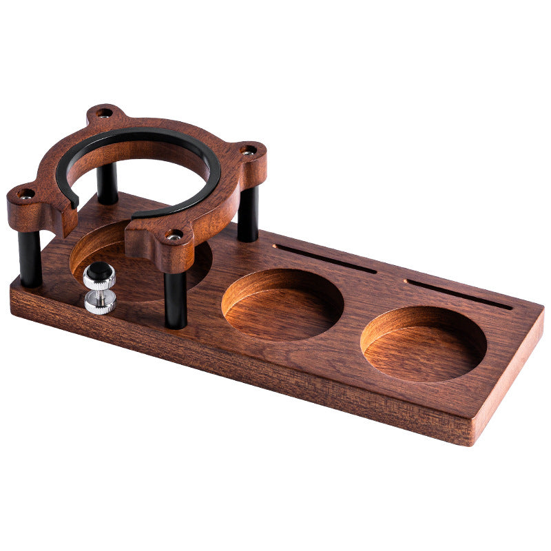 Solid walnut-tone wood barista stand organizing espresso tools on a countertop