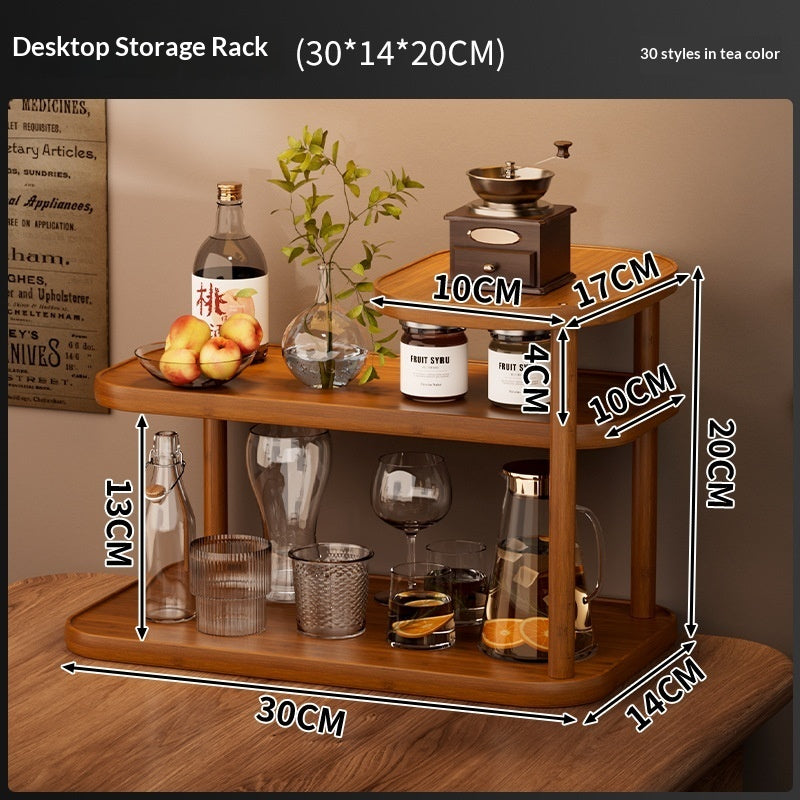 Three-tier wood-tone countertop shelf holding coffee gear on a kitchen counter