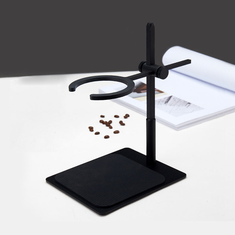 Matte-black adjustable pour-over stand holding a dripper over a cup