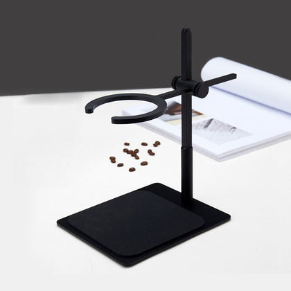 Matte-black adjustable pour-over stand holding a dripper over a cup
