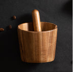Close-up of the acacia grain and turned one-piece body
