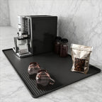 TrueShih Silicone Barista Mat with espresso tools on a tidy coffee counter