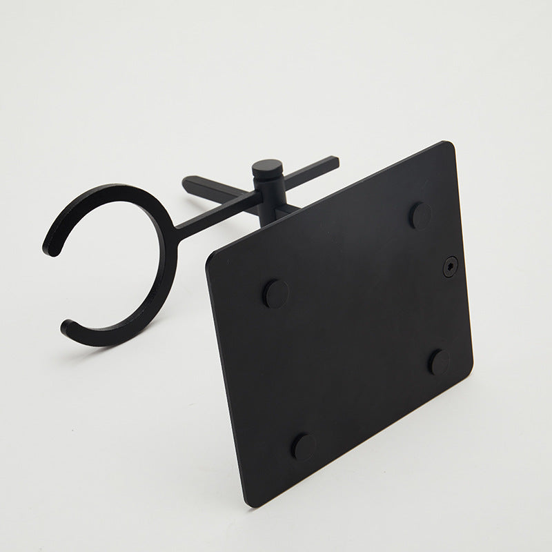 Matte-black pour-over drip stand on a counter