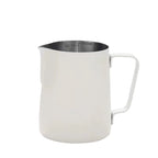 Milk pitcher interior showing ml and oz volume markings