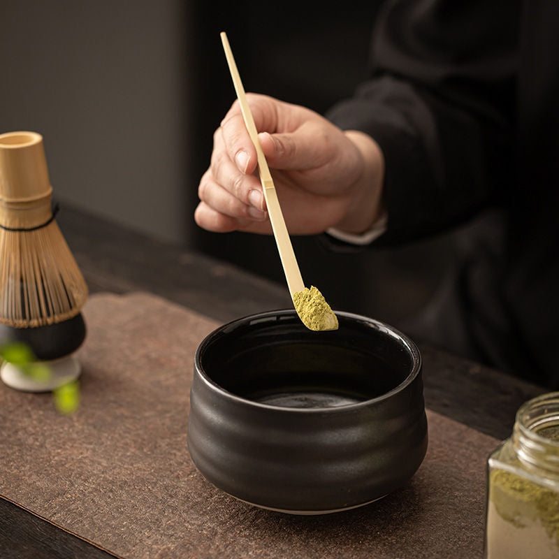 Matcha Ritual Essentials — close-up of bamboo chasen prongs and ceramic whisk holder
