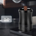 TrueShih dosing cup catching fresh espresso grounds with its built-in 0.1g scale