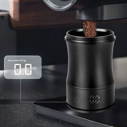 TrueShih dosing cup catching fresh espresso grounds with its built-in 0.1g scale