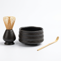 TrueShih The Matcha Ritual Essentials — Obsidian Wave colorway: black kiln-glazed chawan, ceramic whisk holder, bamboo chasen and chashaku on white